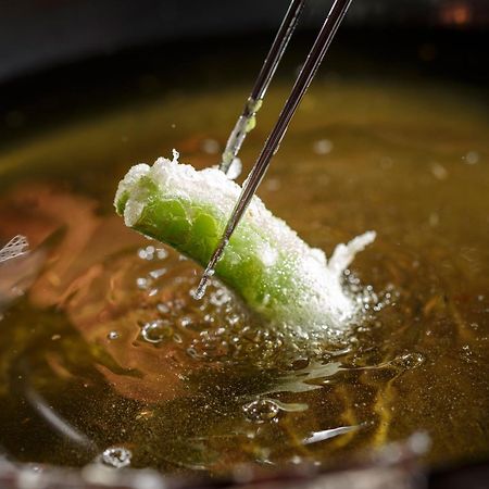 Hotel The Celestine Kyoto Gion Εξωτερικό φωτογραφία A spring roll being dipped in hot oil